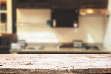 Wood desk space and blurred of kitchen background. for product display montage. business presentation.