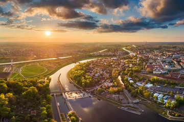 Opole, aerial view of Old Town and Oder river. Poland, spring day. Drone shot on sunset time.