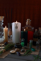 Obraz na płótnie Canvas magic ritual with runes and pentagram and magical attributes