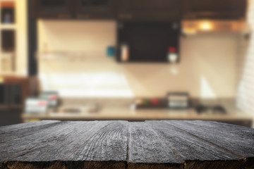 Wood desk space and blurred of kitchen background. for product display montage. business presentation.