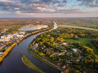 Opole, aerial view of Old Town and Oder river. Poland, spring day. Drone shot on sunset time.