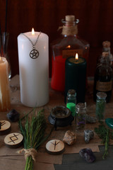 magic ritual with runes and pentagram and magical attributes