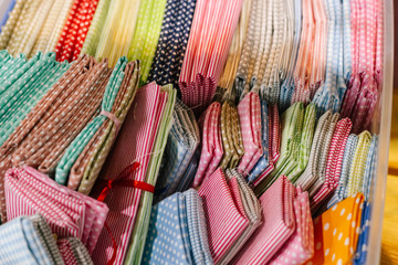 Fototapeta na wymiar Bundle of colored fabric. (Texture, lines, pattern, composition, handmade)