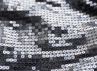 shiny silver sequins on fabric