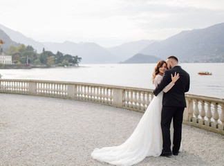 Happy wedding couple in Como Lake, Italy