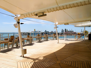 Terrace or patio or balcony on outdoor deck of luxury Hapag-Lloyd cruiseship or cruise ship liner...