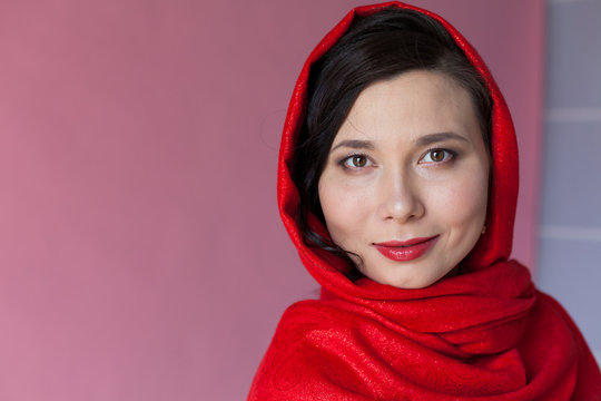 portrait of a beautiful woman Asian woman in a red headscarf