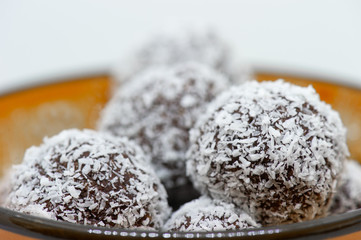 Close up of coconut balls in a bowl