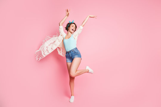 Full length body size view of nice attractive lovely pretty cheerful cheery funky girl dancing disco having fun chill out entertainment air wind blowing isolated over pink pastel color background
