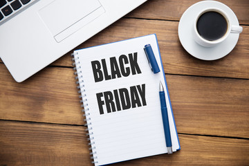 black friday on notepad and computer