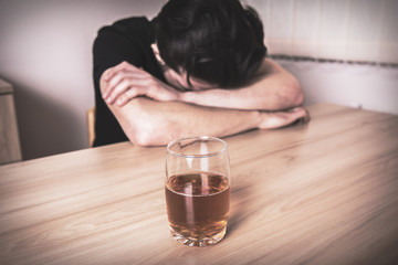 sad man and glass of beer