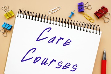 Business concept meaning Care Courses with inscription on the piece of paper.