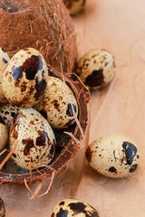 quail eggs on wooden table