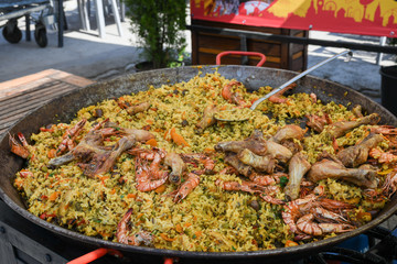 The process of preparing a quesadilla, traditional Mexican dish. Outdoor outside setting