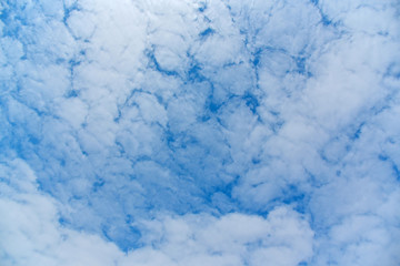 The vast blue sky and clouds sky for texture background.