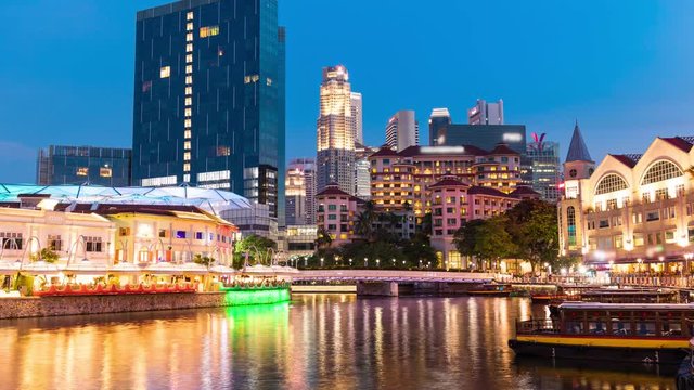 Time lapse view day to night of Clarke Quay in Singapore city
