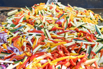 Vegan food, diet. Vegetable sticks, pasta from carrot, zucchini, bell pepper. Mexican food festival.
