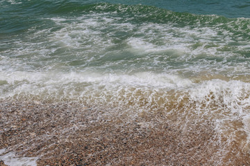 Beautiful waves on the shore of the central beach of Nha Trang, Vietnam.