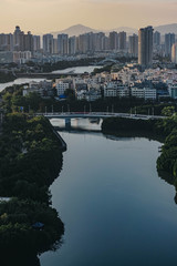 Naklejka premium Cityscape at sunset in the city of Sanya. Hainan island