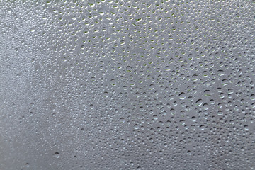 fogged glass with water drops