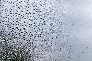 fogged glass with water drops