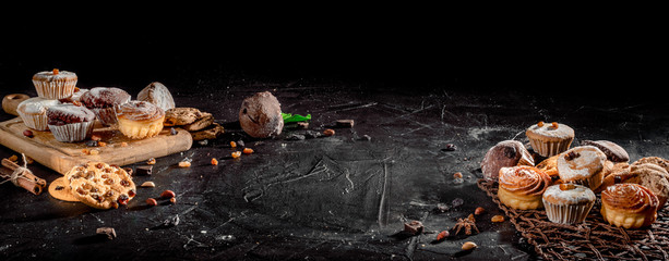 Healthy homemade baking cookies and muffins with nuts. Popular dessert with hot tea or coffee. Copy space top view