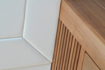 Furniture details aboard a luxury Yacht. Interior. Yachting. Boat. Shipbuilding Industry. Wooden panels and upholstery. Interior design.