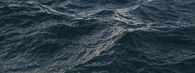 Closeup surface of wavy ocean blue sea water. Abstract Background Texture.3d rendering