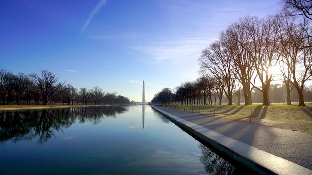 Washington Monument at National Mall at dawn,Washington Monument on the Reflecting Pool in Washington DC, USA 