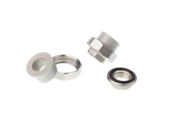 Disassembled plastic PPR straight metal thread coupling for water pipes, isolated on white background