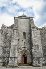 Front view of the fortified monastery of Saint-Michel des Anges at Saint-Angel, France. 