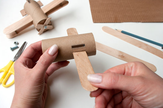 How To Make Airplane. Hand Made Toy,zero Waste From Toilet Paper Roll And Popsicle Sticks. For Kids And Parents. Step 4, First Try Wings.