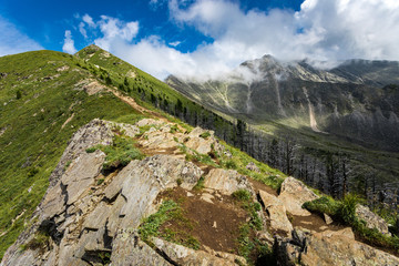 view from the top of the mountain to the clouds below