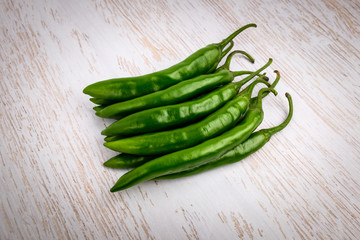 Green spicy pepper with background