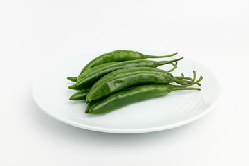 Green spicy pepper with background