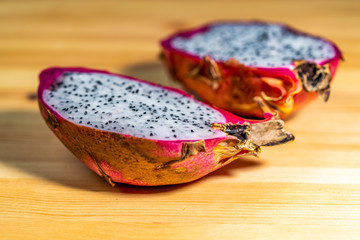 Pitaya or dragon fruit on wooden background
