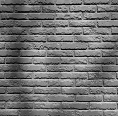 Old vintage brick wall for background. Brick surface template photo. Black and white photo.