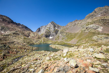 Obraz premium Looking at a beautiful Ibon de Panticosa in the Pyrenees, Aragon. Spain