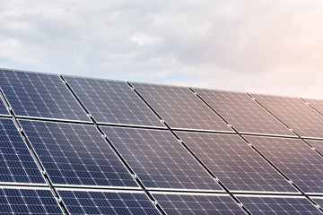 close-up view of solar panels on a background of sunny blue sky
