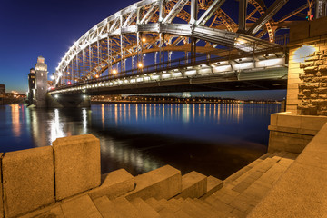 Bolsheokhtinsky bridge over the Neva river in Saint Petersburg at night