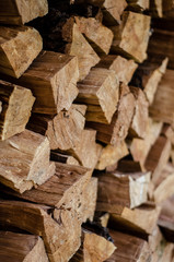 stack of firewood stacked in focus.