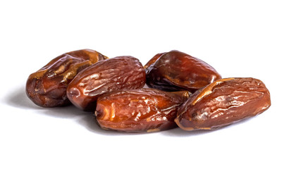 Dry dates on a white isolated background