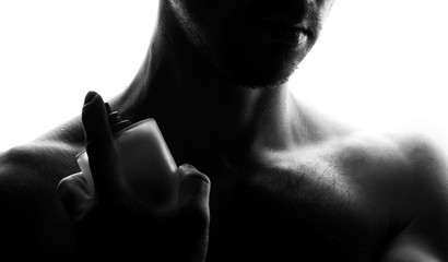black and white photo guy with perfume