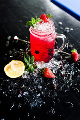 cocktail with strawberry and mint