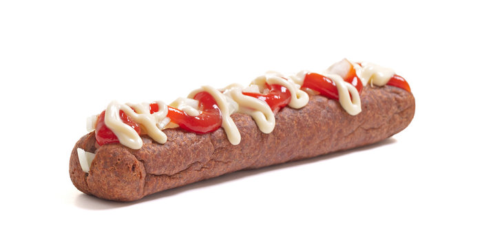 One frikadel with ketchup, mayonnaise on chopped onions, a Dutch fast food snack called 'frikadel speciaal'