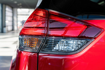 Close-up of the rear light of a modern car. Exterior details.