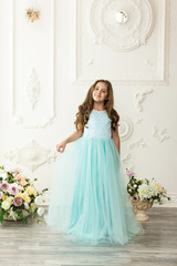 Fototapeta premium Little girl child in a fashionable dress