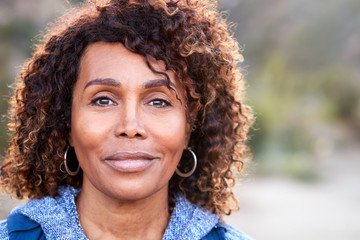 Outdoor Portrait Of Serious African American Senior Woman With Mental Health Concerns