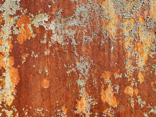 Rusty metal panel with cracked paint, corroded grunge metal background