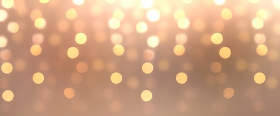 Xmas garland lights abstract pattern on beige blur background.